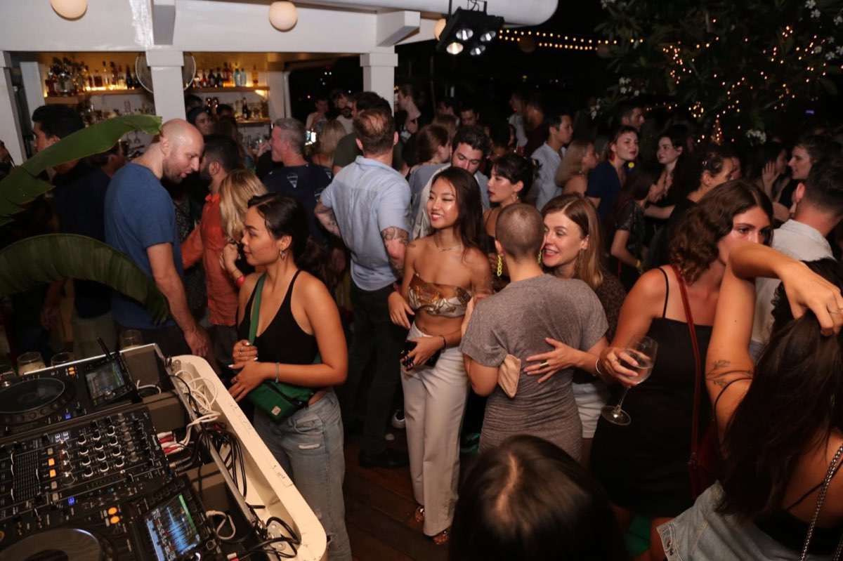 Late-night rooftop party in District 1, Saigon